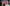 Photo showing Maxine Laceby and her two daughters at an awards entry. They are all white women smiling at the camera - Maxine has short grey hair and her daughters are in their twenties and have dark hair.